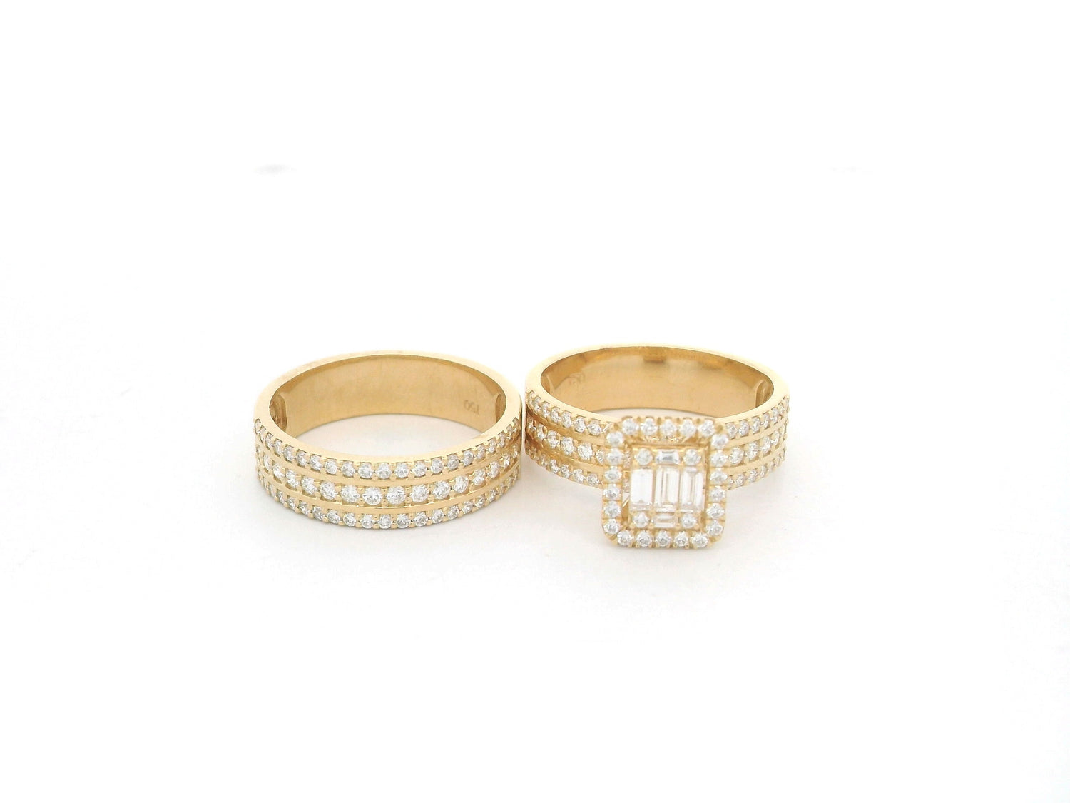 Baguette and round diamond bridal set in 18K yellow gold with square halo and triple row bands by Emirates Diamonds