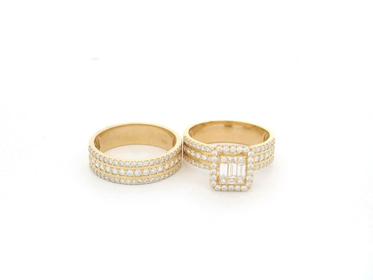 Baguette and round diamond bridal set in 18K yellow gold with square halo and triple row bands by Emirates Diamonds