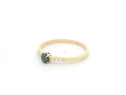 Black diamond ring 0.25 carat with diamond accents in 18K yellow gold by Emirates Diamonds