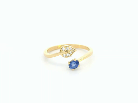 18K yellow gold sapphire diamond bypass ring by Emirates Diamonds