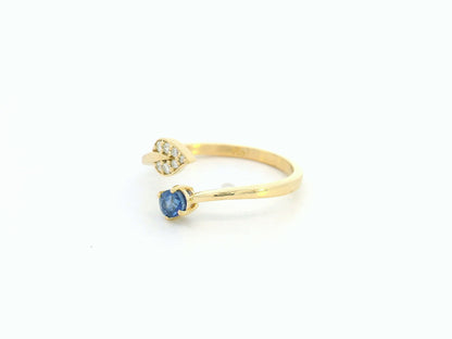 18K yellow gold sapphire diamond bypass ring by Emirates Diamonds