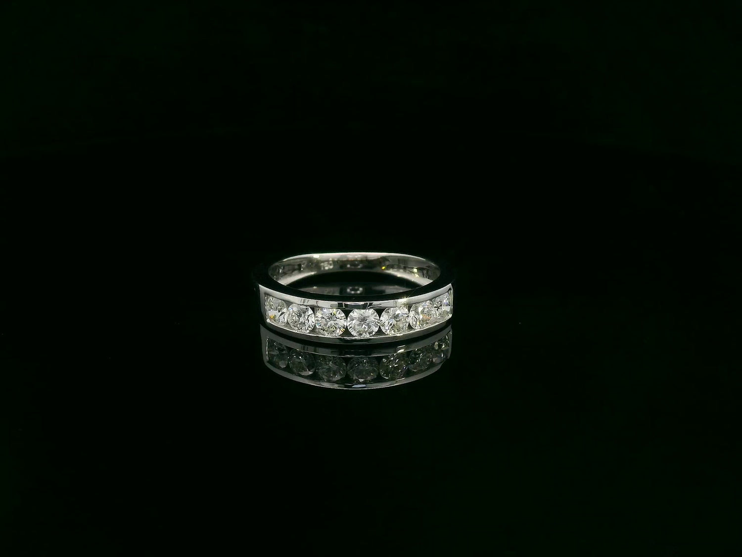 0.92 carat diamond channel set band ring in 18K white gold unisex design by Emirates Diamonds