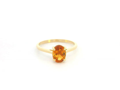 18K yellow gold oval citrine solitaire ring by Emirates Diamonds