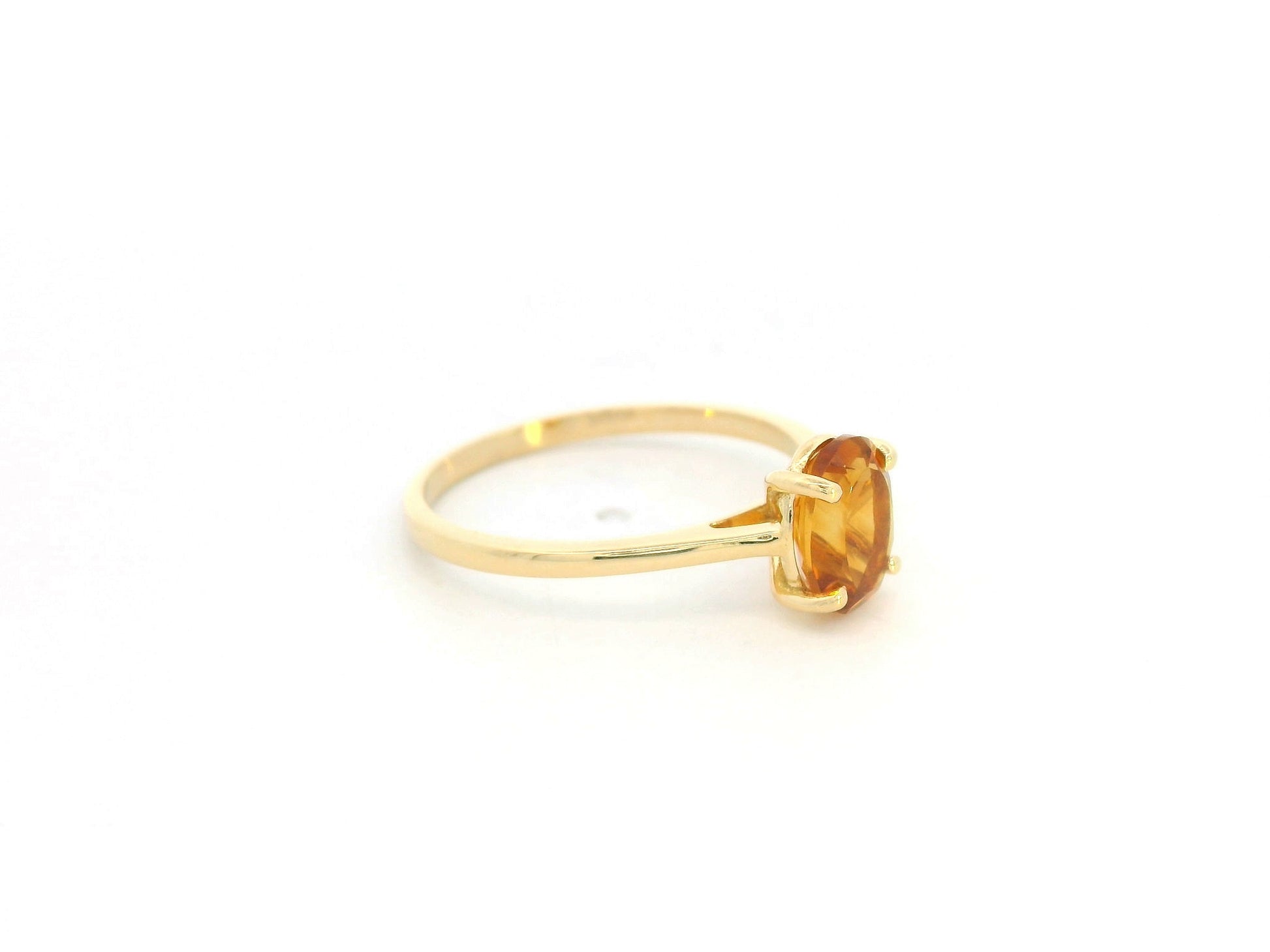 18K yellow gold oval citrine solitaire ring by Emirates Diamonds