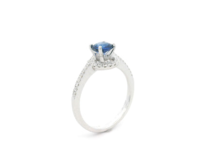 0.67 carat blue sapphire and diamond halo ring in 18K white gold by Emirates Diamonds