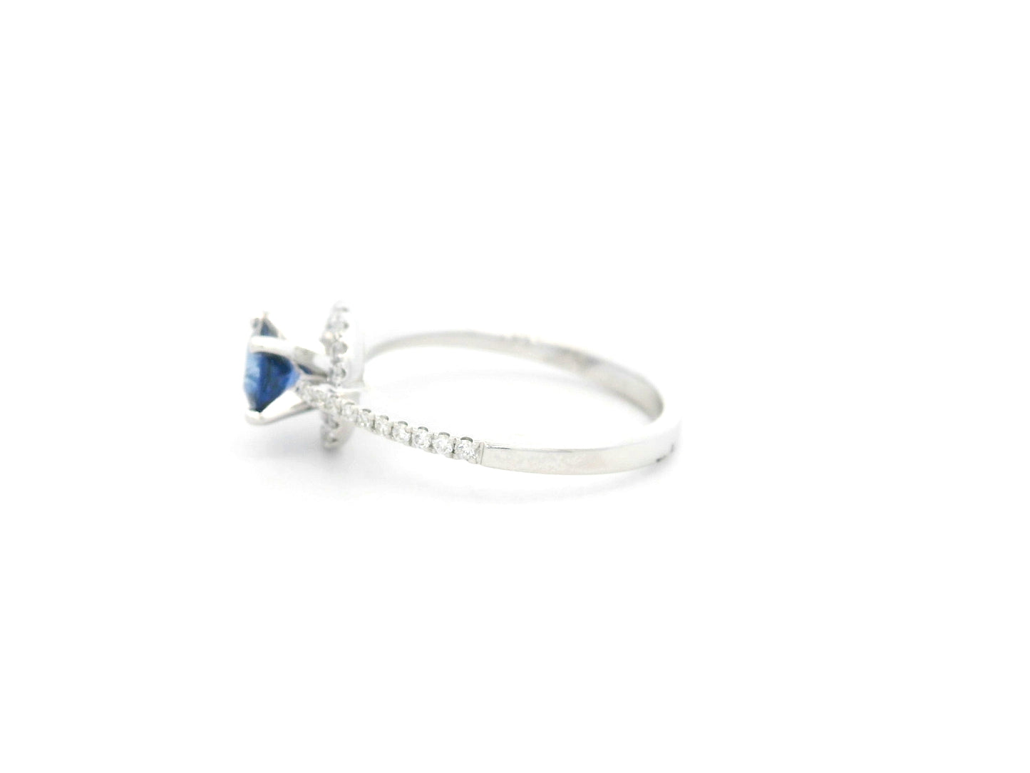 0.67 carat blue sapphire and diamond halo ring in 18K white gold by Emirates Diamonds