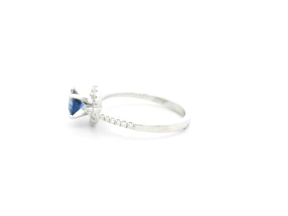 0.67 carat blue sapphire and diamond halo ring in 18K white gold by Emirates Diamonds