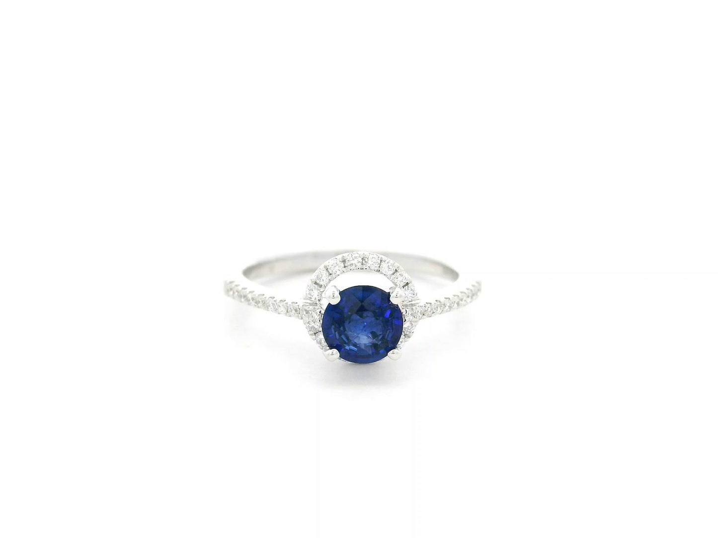 0.67 carat blue sapphire and diamond halo ring in 18K white gold by Emirates Diamonds