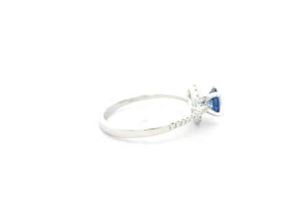 0.67 carat blue sapphire and diamond halo ring in 18K white gold by Emirates Diamonds