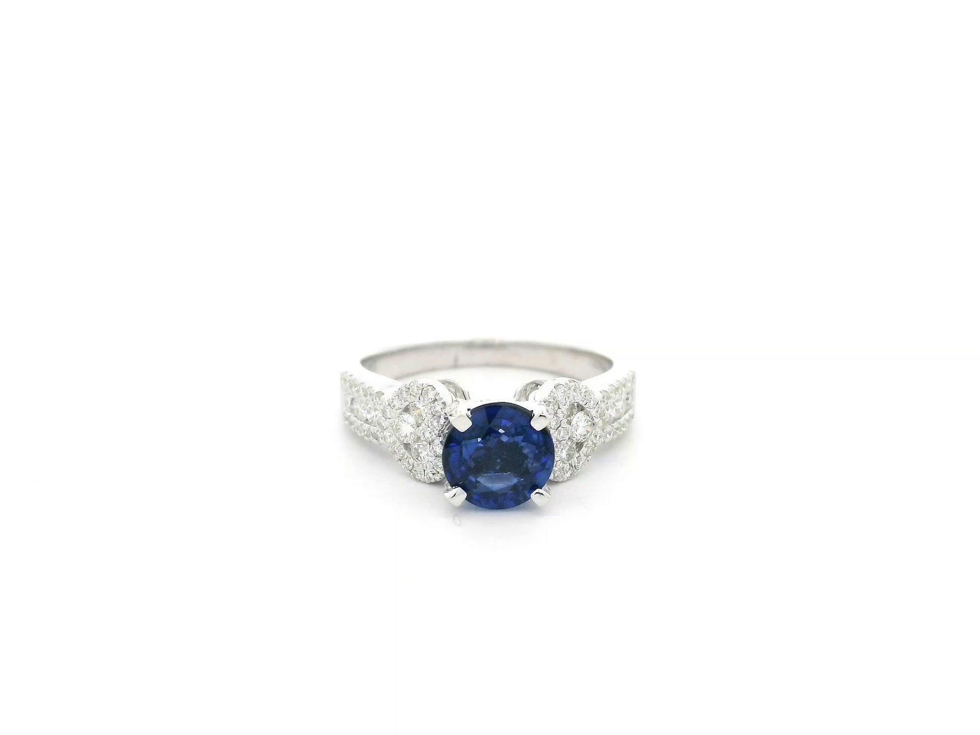 Blue sapphire diamond ring in 18K white gold with sculpted diamond band – Emirates Diamonds