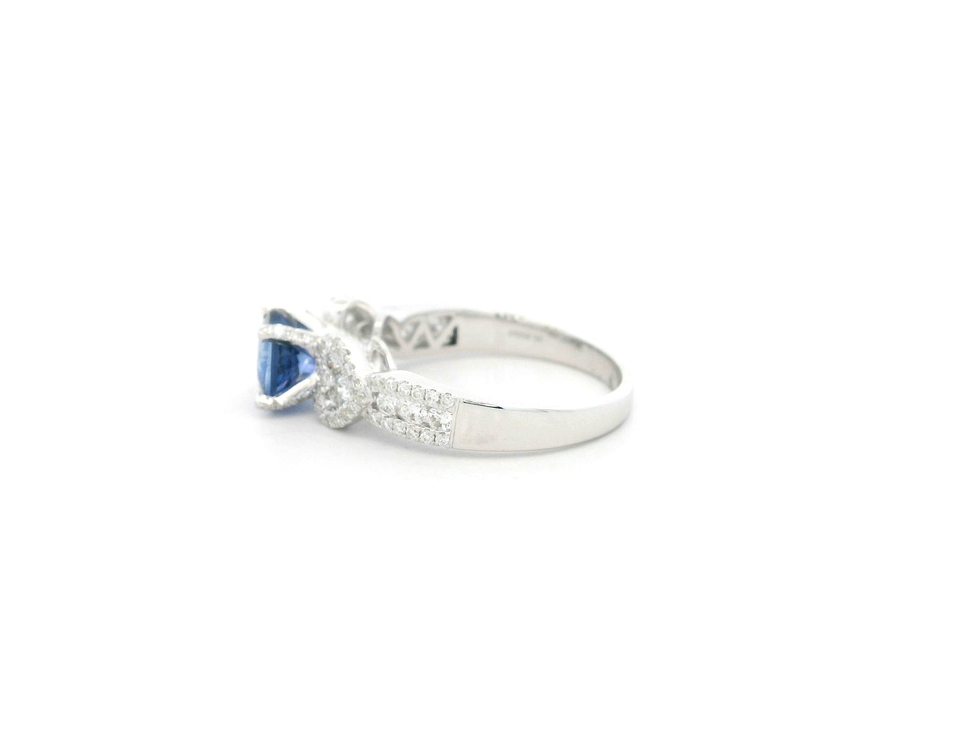 Blue sapphire diamond ring in 18K white gold with sculpted diamond band – Emirates Diamonds