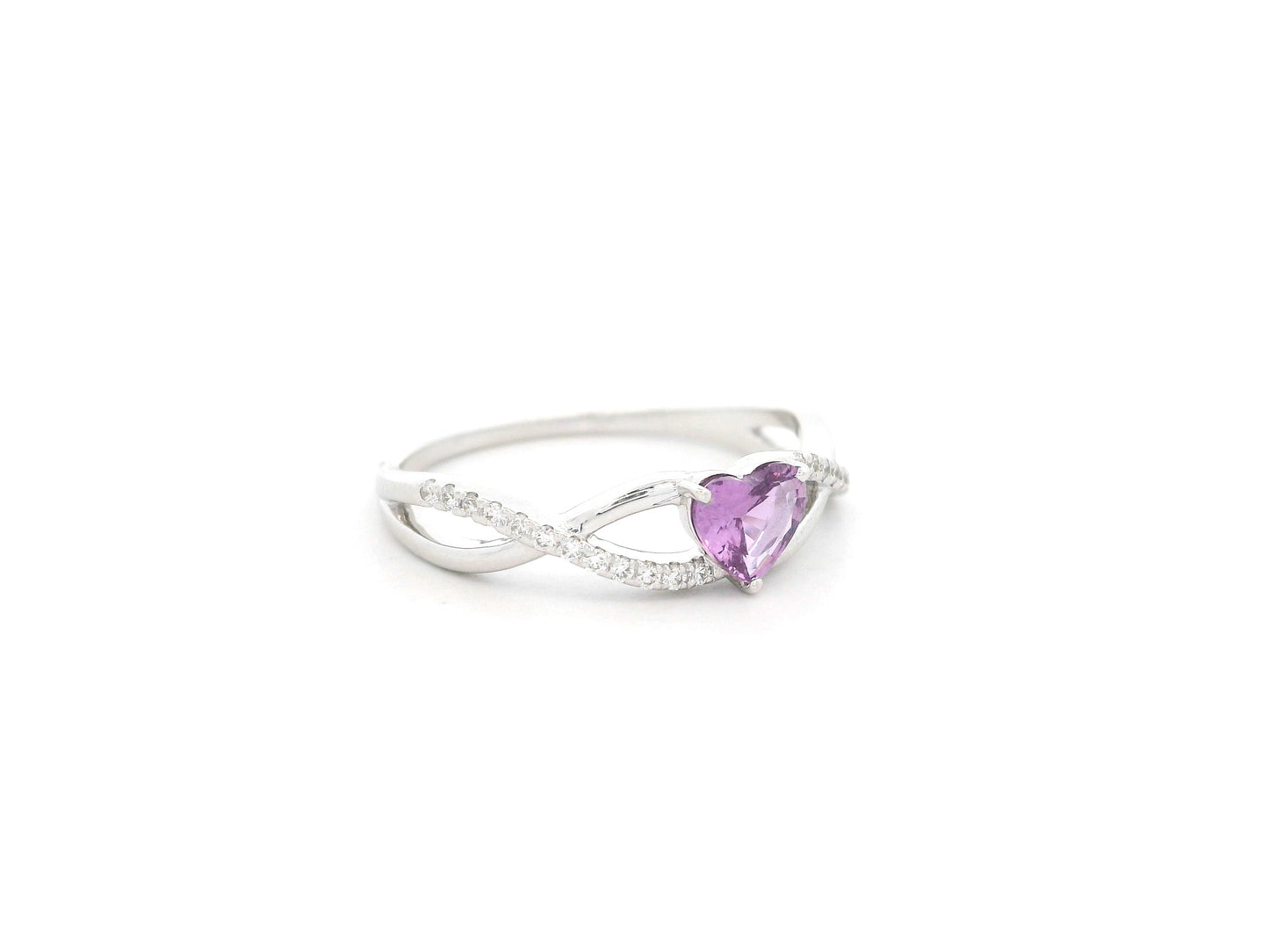 Heart-shaped pink sapphire and diamond ring in 18K white gold with curved band design – Emirates Diamonds
