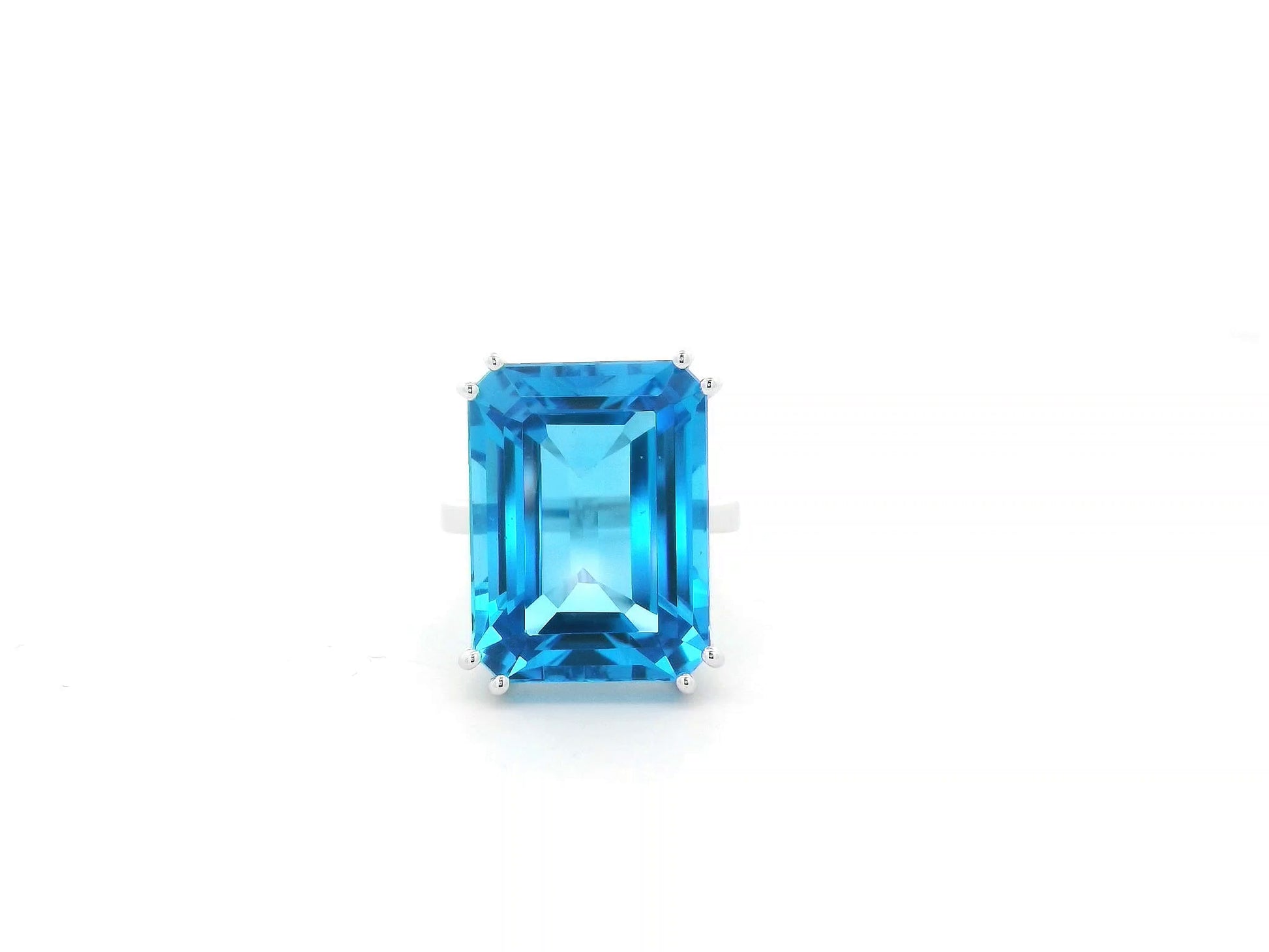 27.63 carat Swiss Blue Topaz emerald cut ring in 18K white gold by Emirates Diamonds