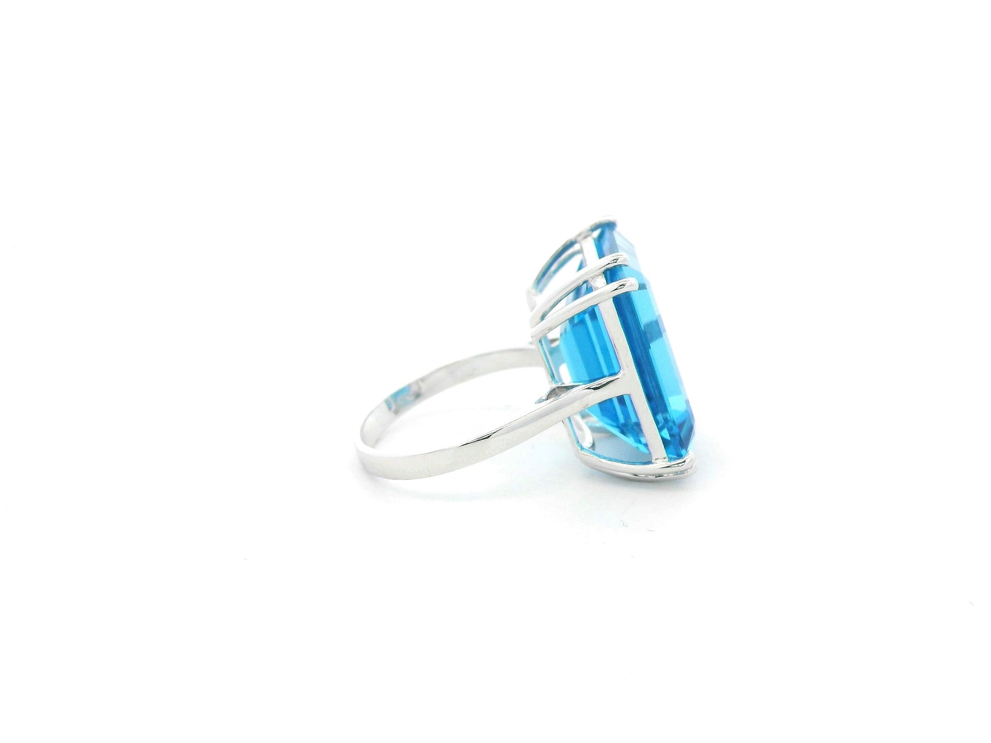 27.63 carat Swiss Blue Topaz emerald cut ring in 18K white gold by Emirates Diamonds