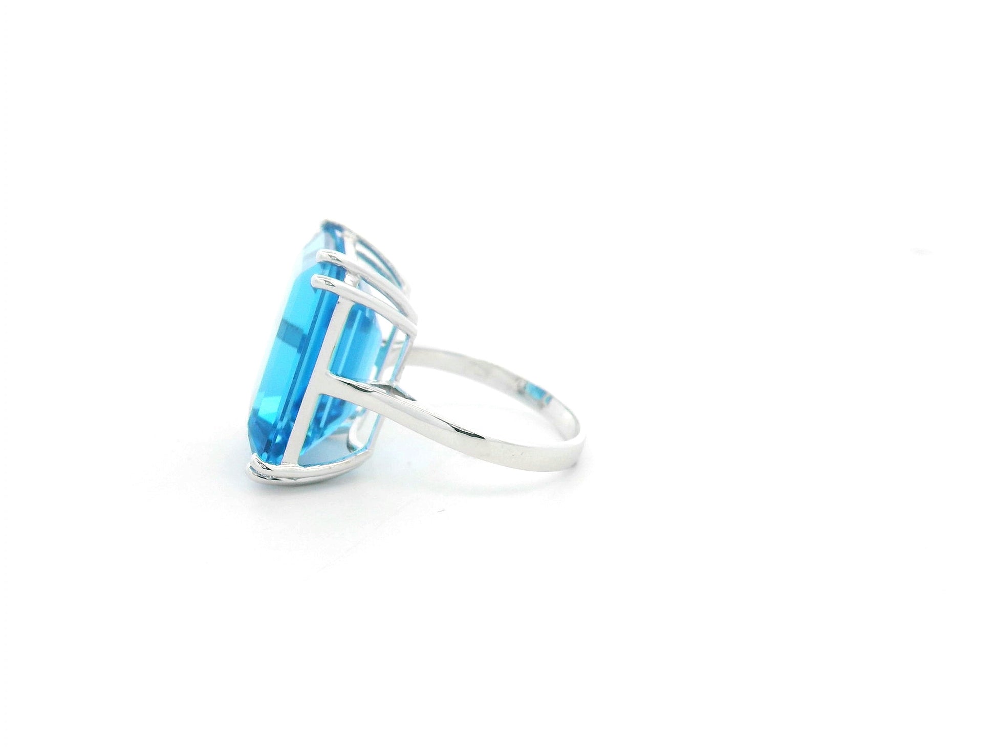 27.63 carat Swiss Blue Topaz emerald cut ring in 18K white gold by Emirates Diamonds