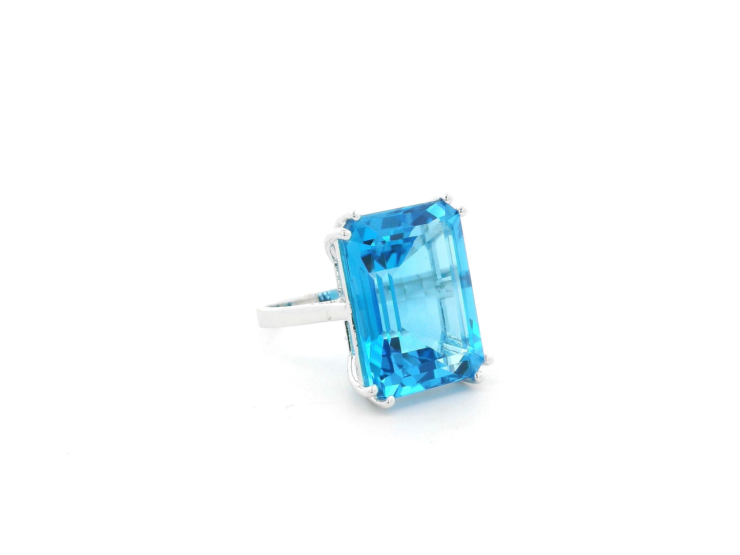 27.63 carat Swiss Blue Topaz emerald cut ring in 18K white gold by Emirates Diamonds