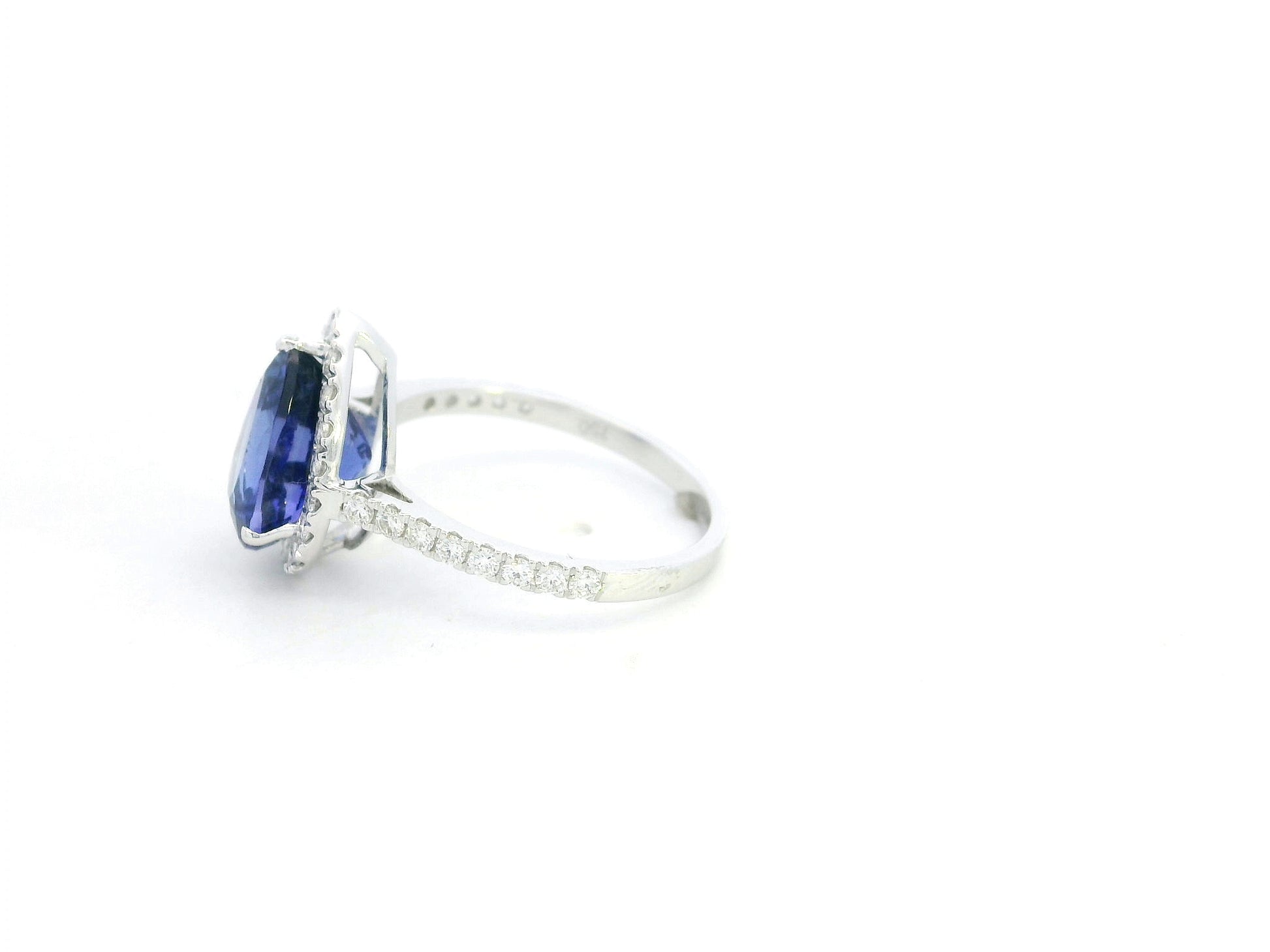 Pear cut tanzanite ring 3.83 carat with diamond halo in 18K white gold by Emirates Diamonds