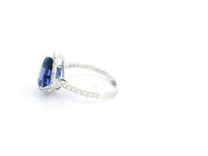 Pear cut tanzanite ring 3.83 carat with diamond halo in 18K white gold by Emirates Diamonds