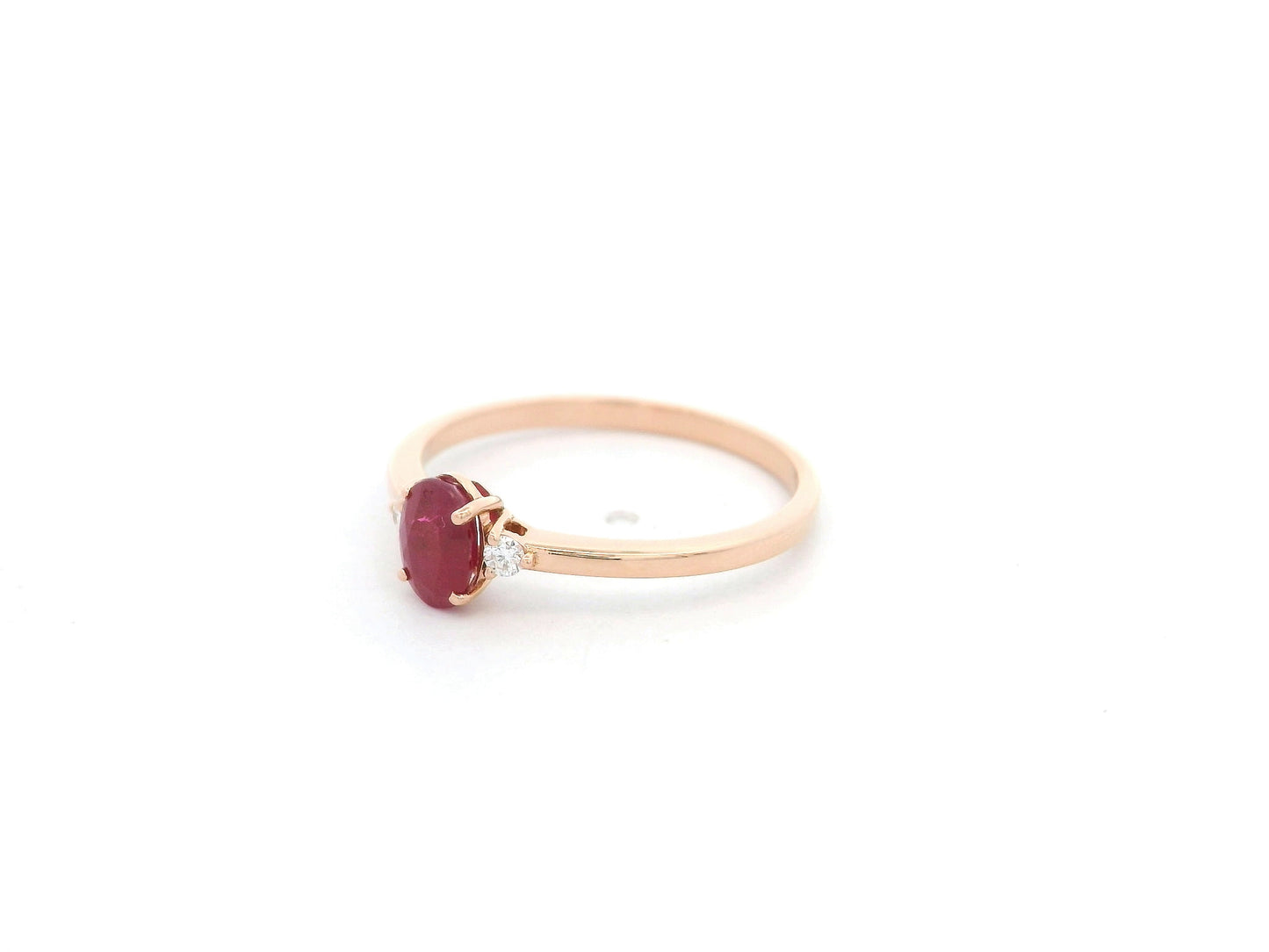 Oval ruby and diamond ring in 18K rose gold by Emirates Diamonds