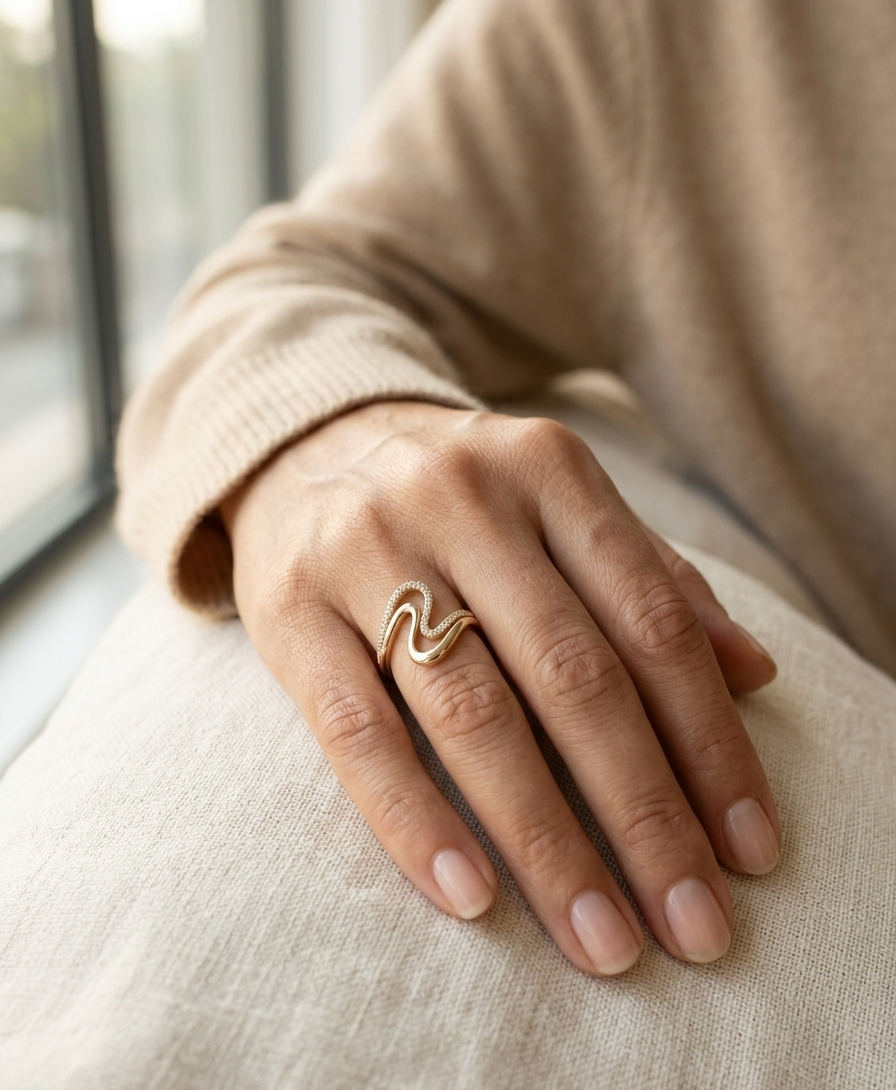 Diamond statement ring with sculptural design in 18K yellow gold by Emirates Diamonds