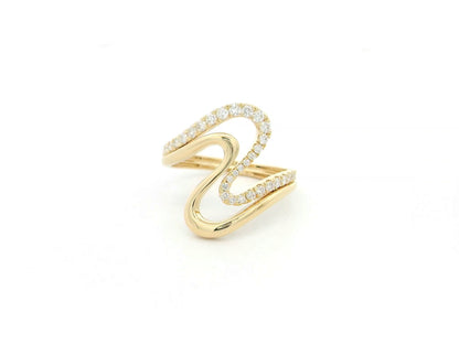 Diamond statement ring with sculptural design in 18K yellow gold by Emirates Diamonds
