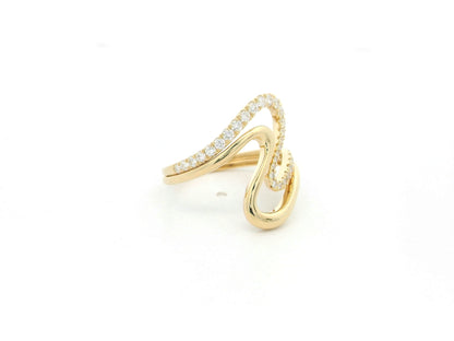 Diamond statement ring with sculptural design in 18K yellow gold by Emirates Diamonds