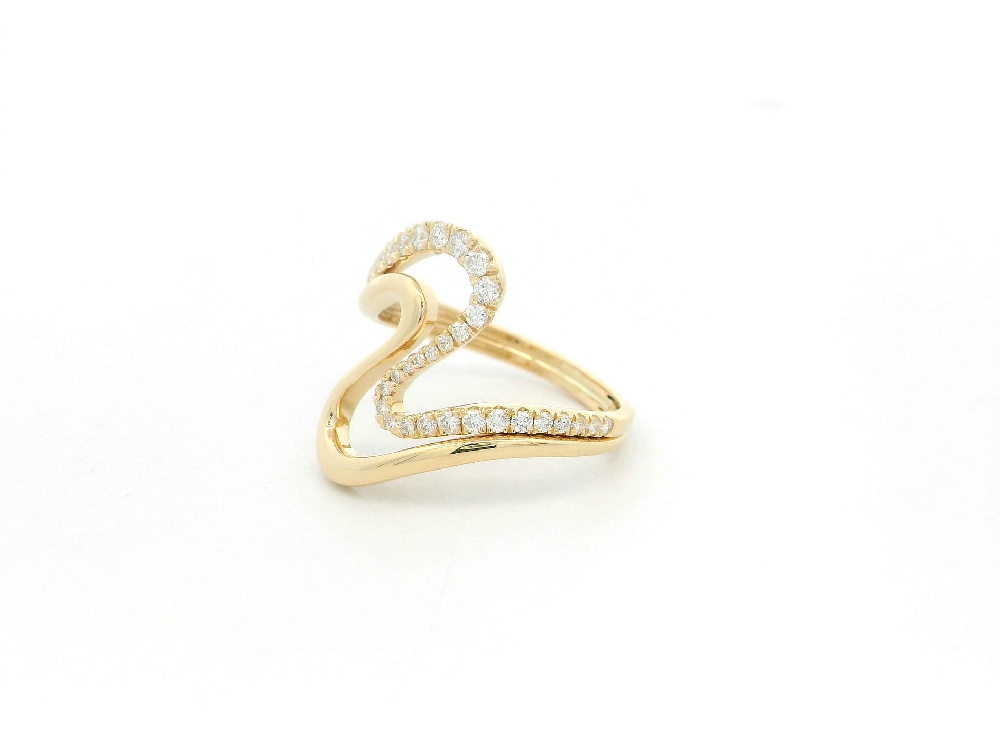 Diamond statement ring with sculptural design in 18K yellow gold by Emirates Diamonds