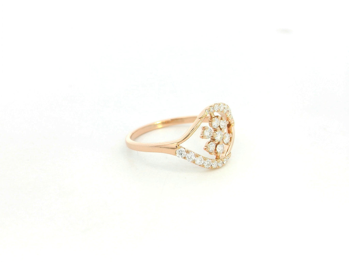 18K rose gold diamond floral cluster ring with geometric halo frame design