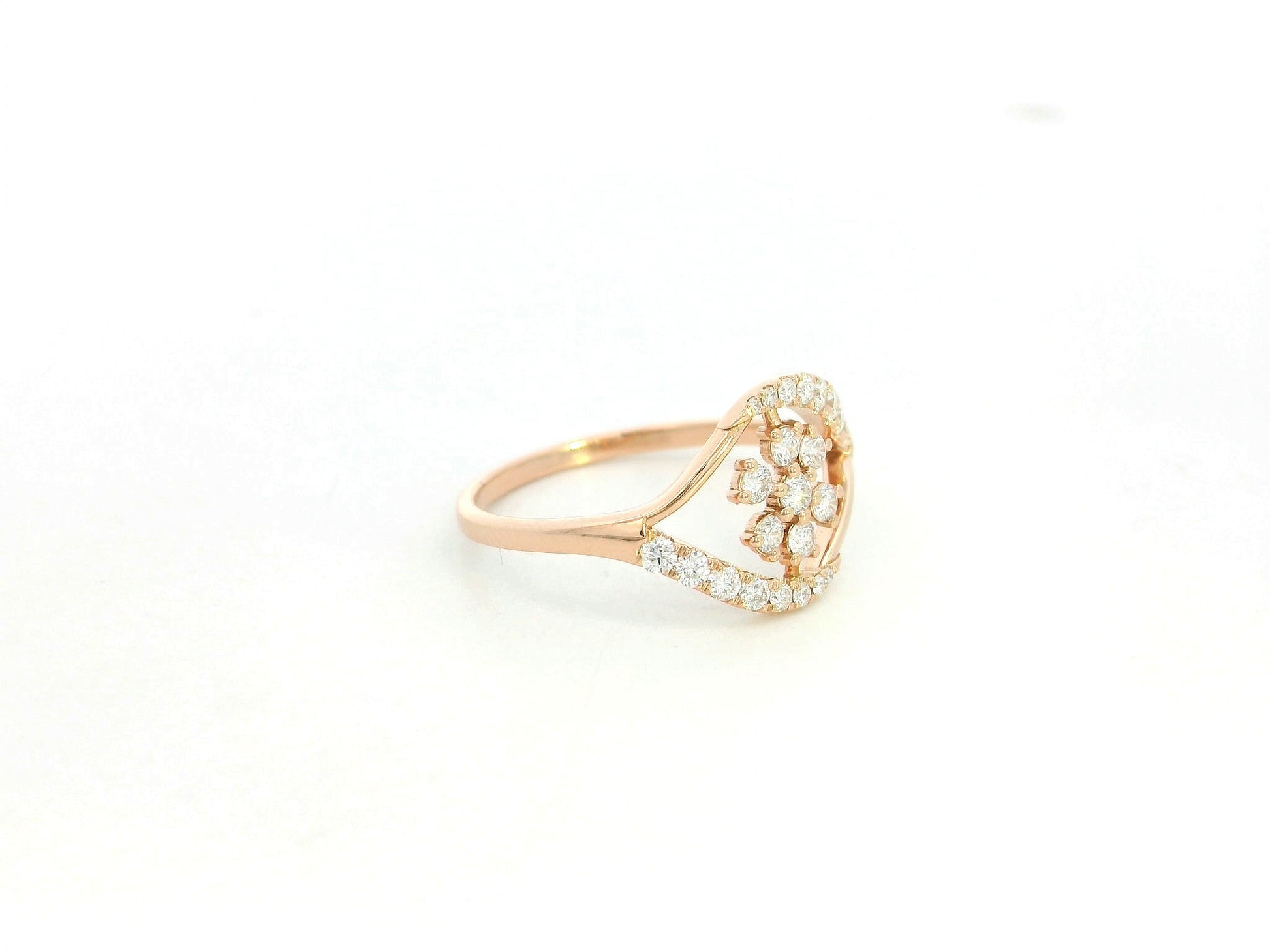 18K rose gold diamond floral cluster ring with geometric halo frame design