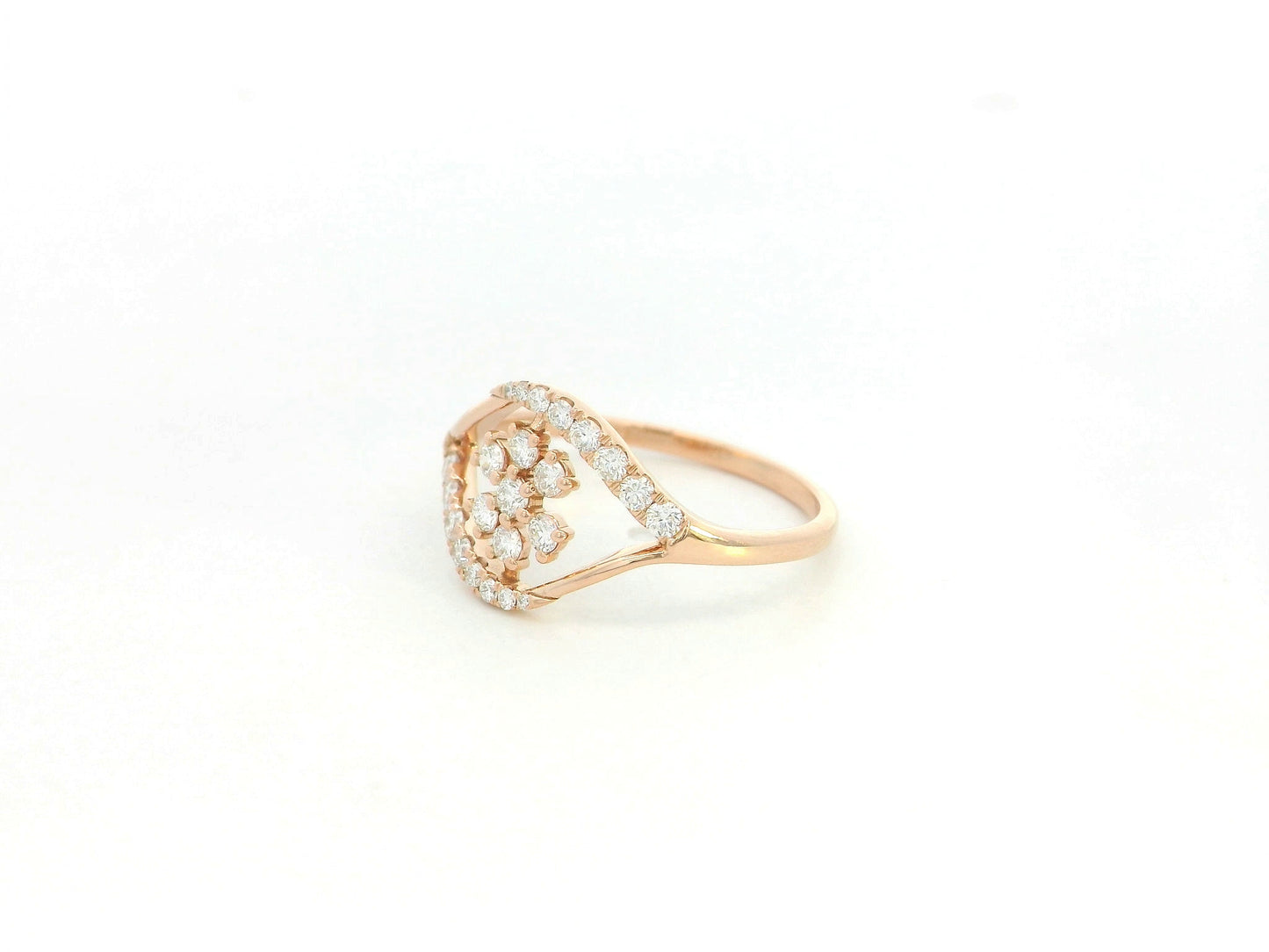 18K rose gold diamond floral cluster ring with geometric halo frame design