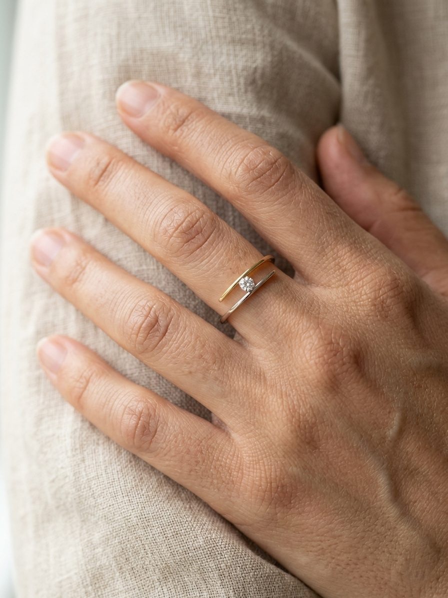 Two-tone diamond open wrap ring in 18K yellow and white gold with round diamond