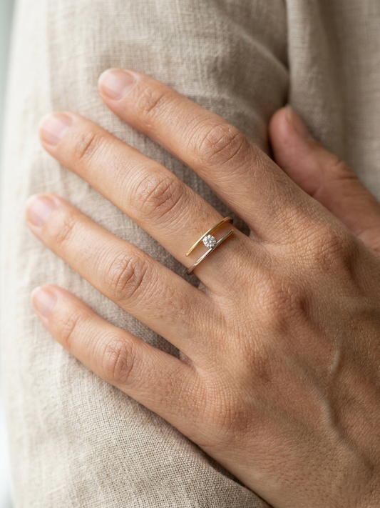 Two-tone diamond open wrap ring in 18K yellow and white gold with round diamond
