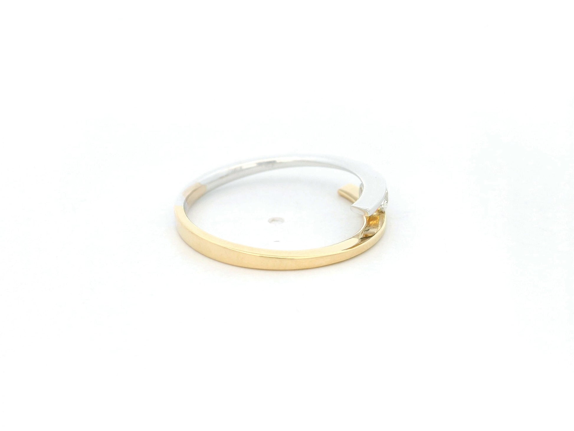 Two-tone diamond open wrap ring in 18K yellow and white gold with round diamond