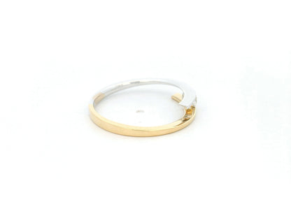 Two-tone diamond open wrap ring in 18K yellow and white gold with round diamond