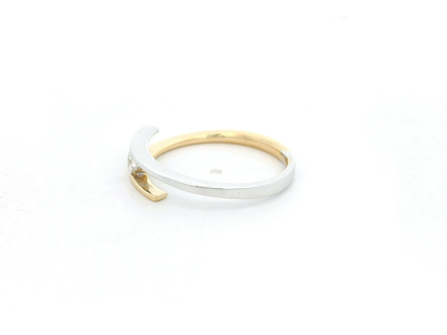 Two-tone diamond open wrap ring in 18K yellow and white gold with round diamond