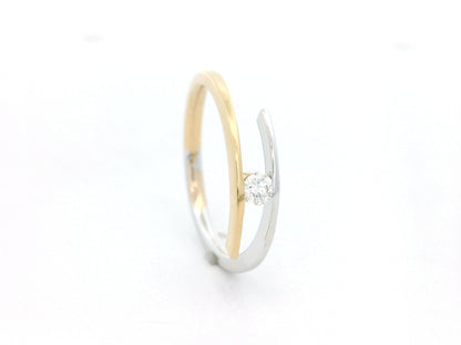 Two-tone diamond open wrap ring in 18K yellow and white gold with round diamond