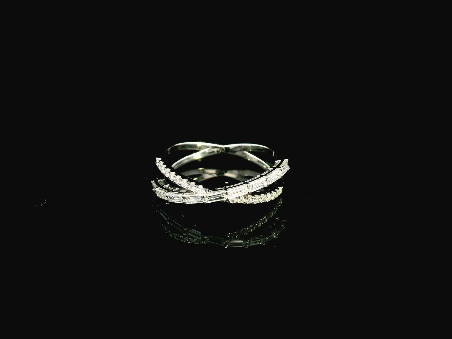 Baguette and round diamond crossover ring in 18K white gold criss-cross design Emirates Diamonds