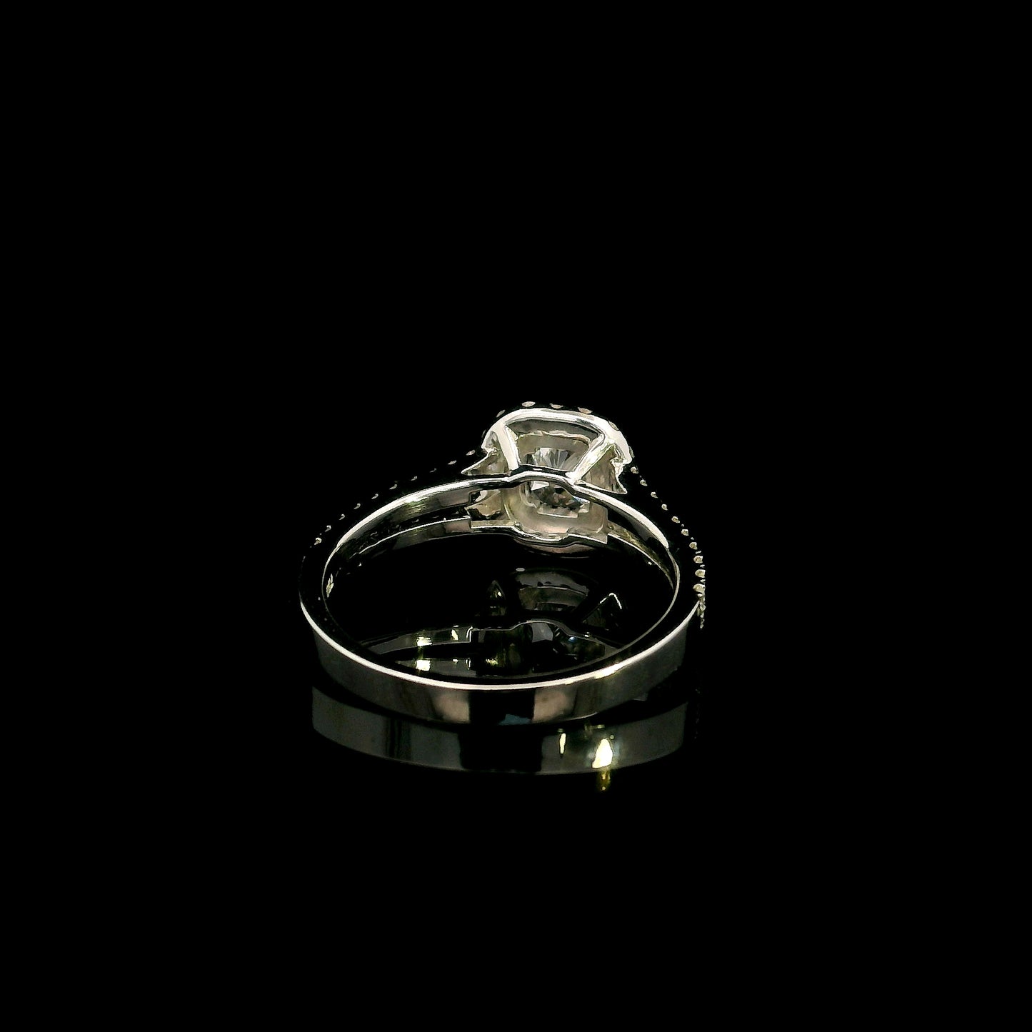 18K white gold halo engagement ring featuring a 0.51 carat GIA certified natural cushion cut diamond with D colour and VS2 clarity, surrounded by a double halo and split shank set with 0.50 carat natural round brilliant diamonds.