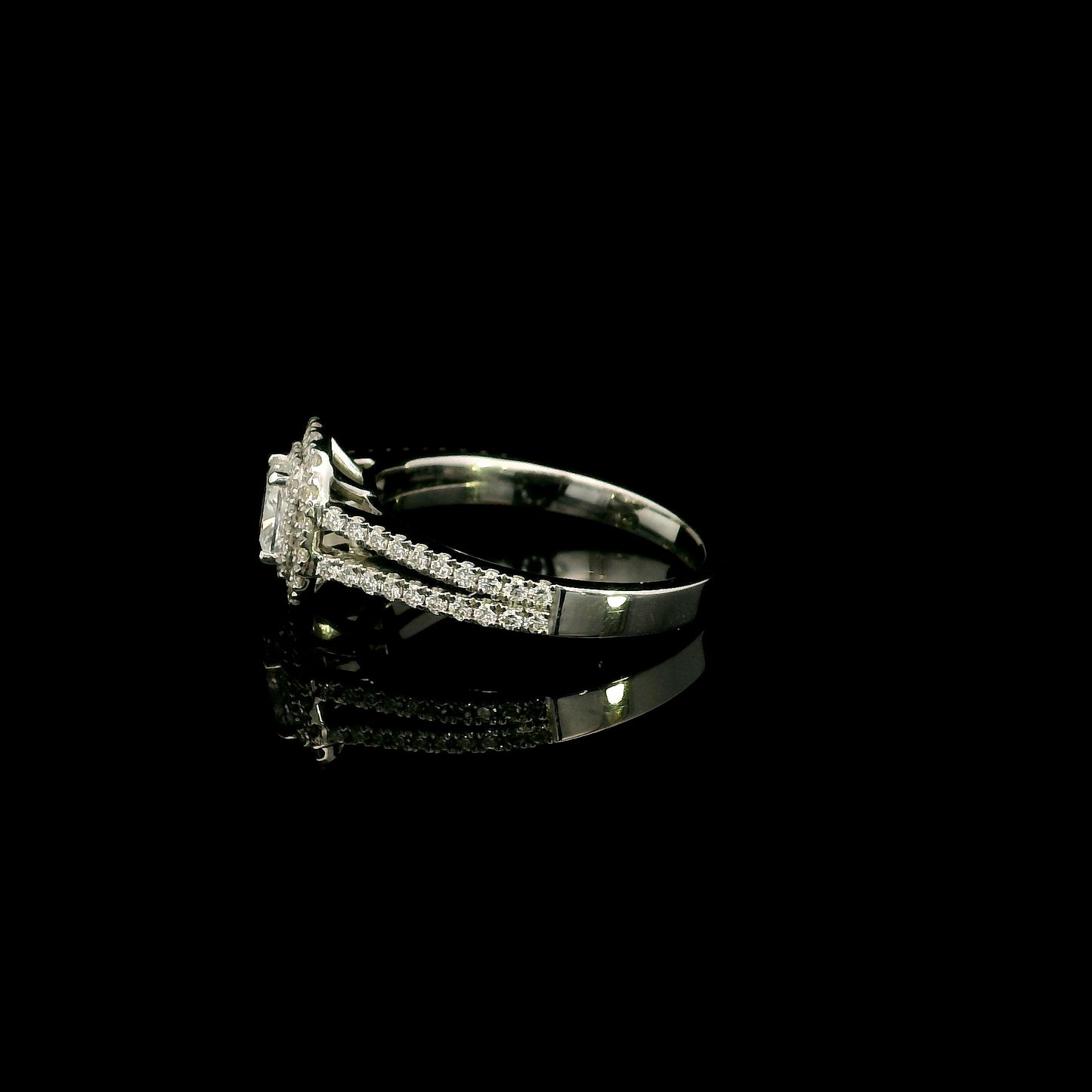 18K white gold halo engagement ring featuring a 0.51 carat GIA certified natural cushion cut diamond with D colour and VS2 clarity, surrounded by a double halo and split shank set with 0.50 carat natural round brilliant diamonds.
