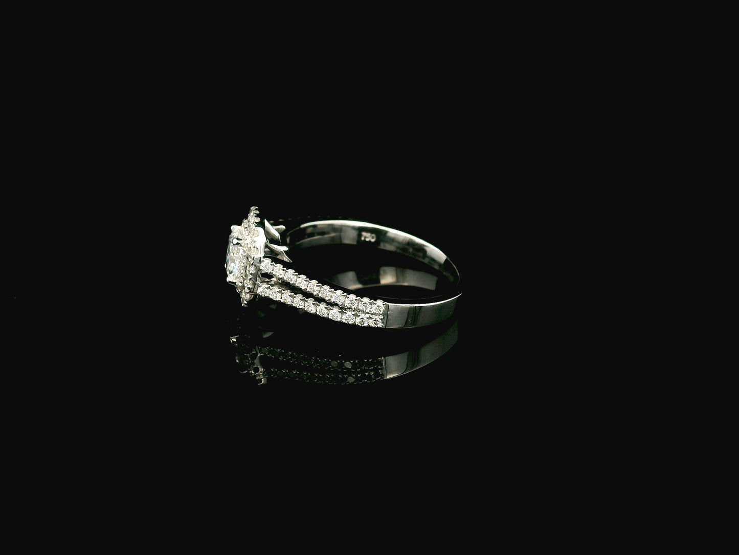 Cushion cut diamond halo ring in 18K white gold with GIA certified center diamond and diamond band – Emirates Diamonds