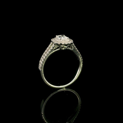 18K white gold halo engagement ring featuring a 0.51 carat GIA certified natural cushion cut diamond with D colour and VS2 clarity, surrounded by a double halo and split shank set with 0.50 carat natural round brilliant diamonds.