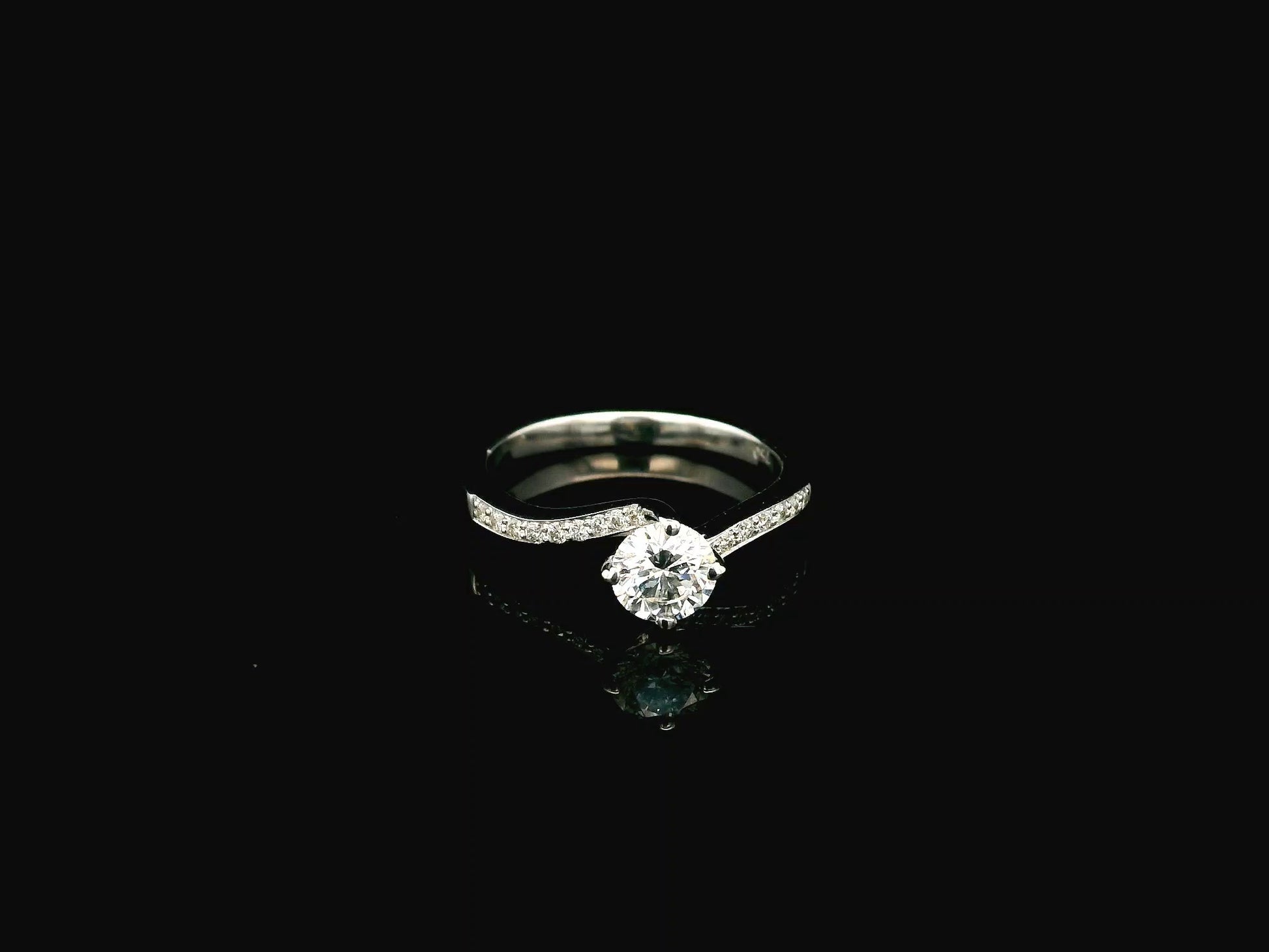 0.51 carat round diamond engagement ring in 18K white gold with curved diamond band – Emirates Diamonds
