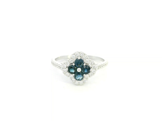 Blue sapphire and diamond floral cluster ring in 18K white gold