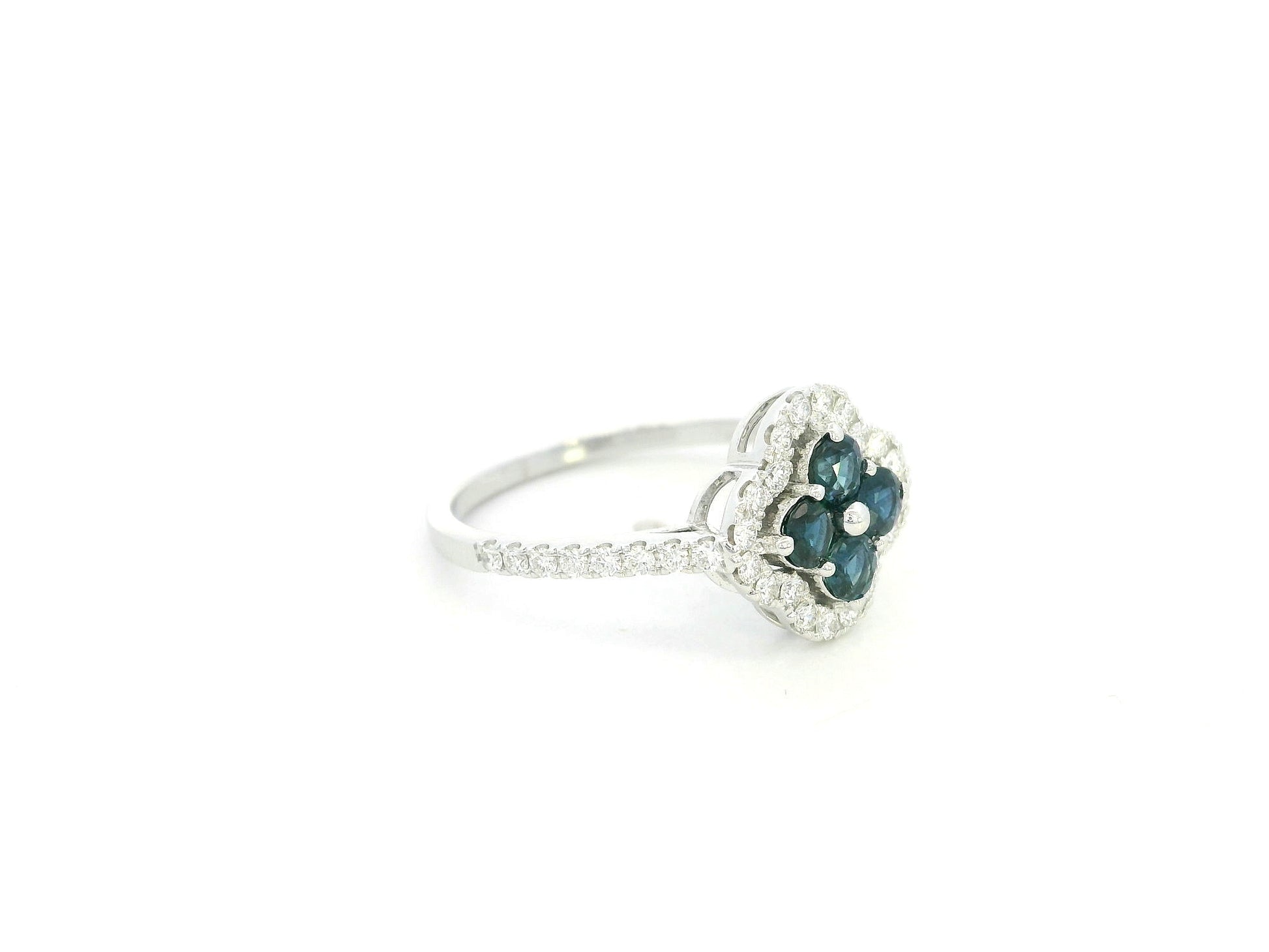 Blue sapphire and diamond floral cluster ring in 18K white gold