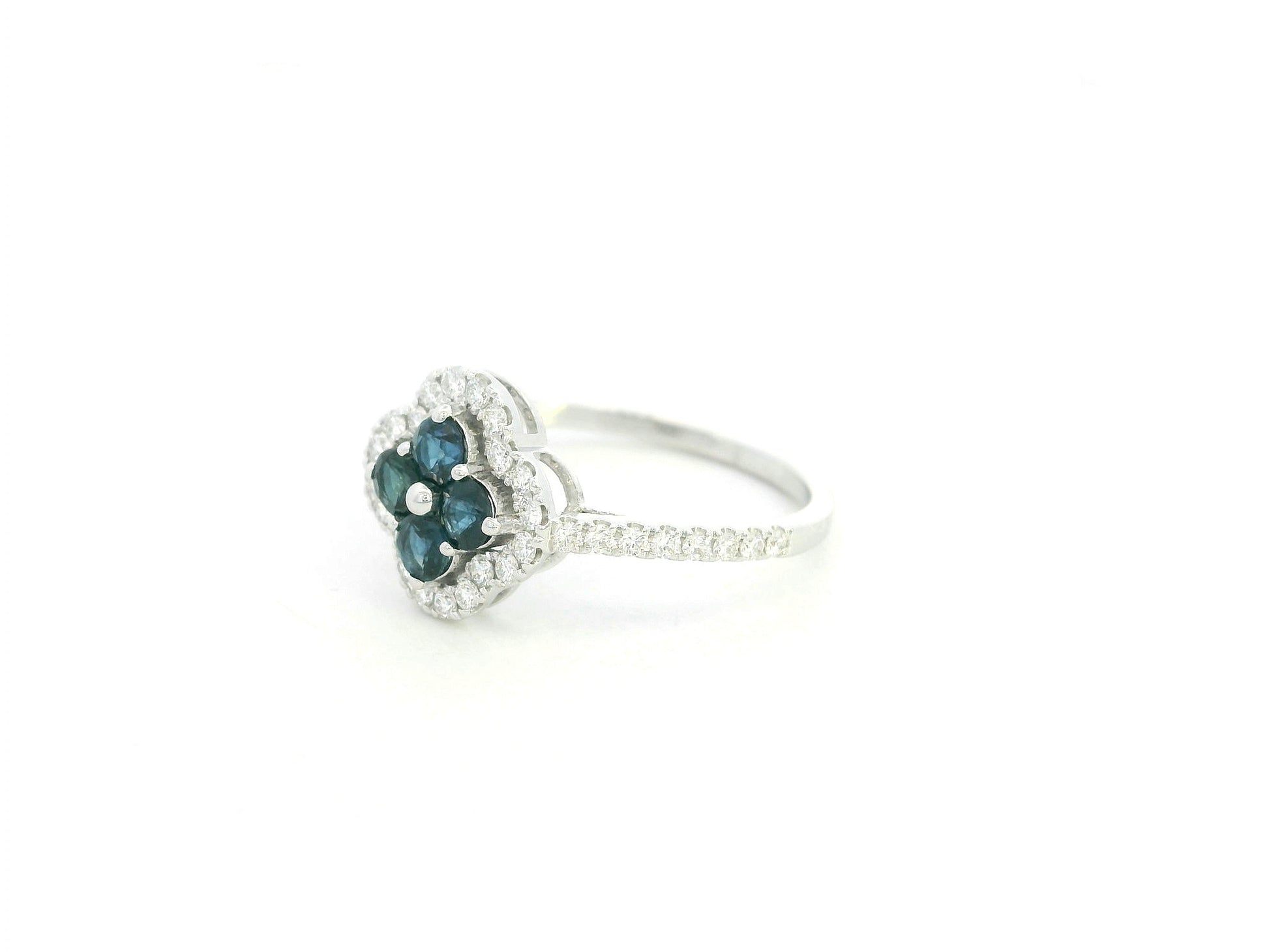 Blue sapphire and diamond floral cluster ring in 18K white gold