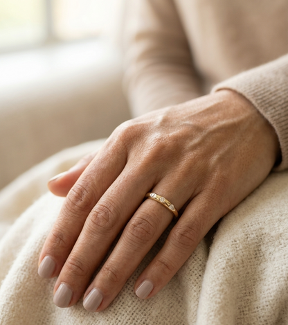 Minimal diamond band ring in 18K yellow gold with 0.13 carat diamonds