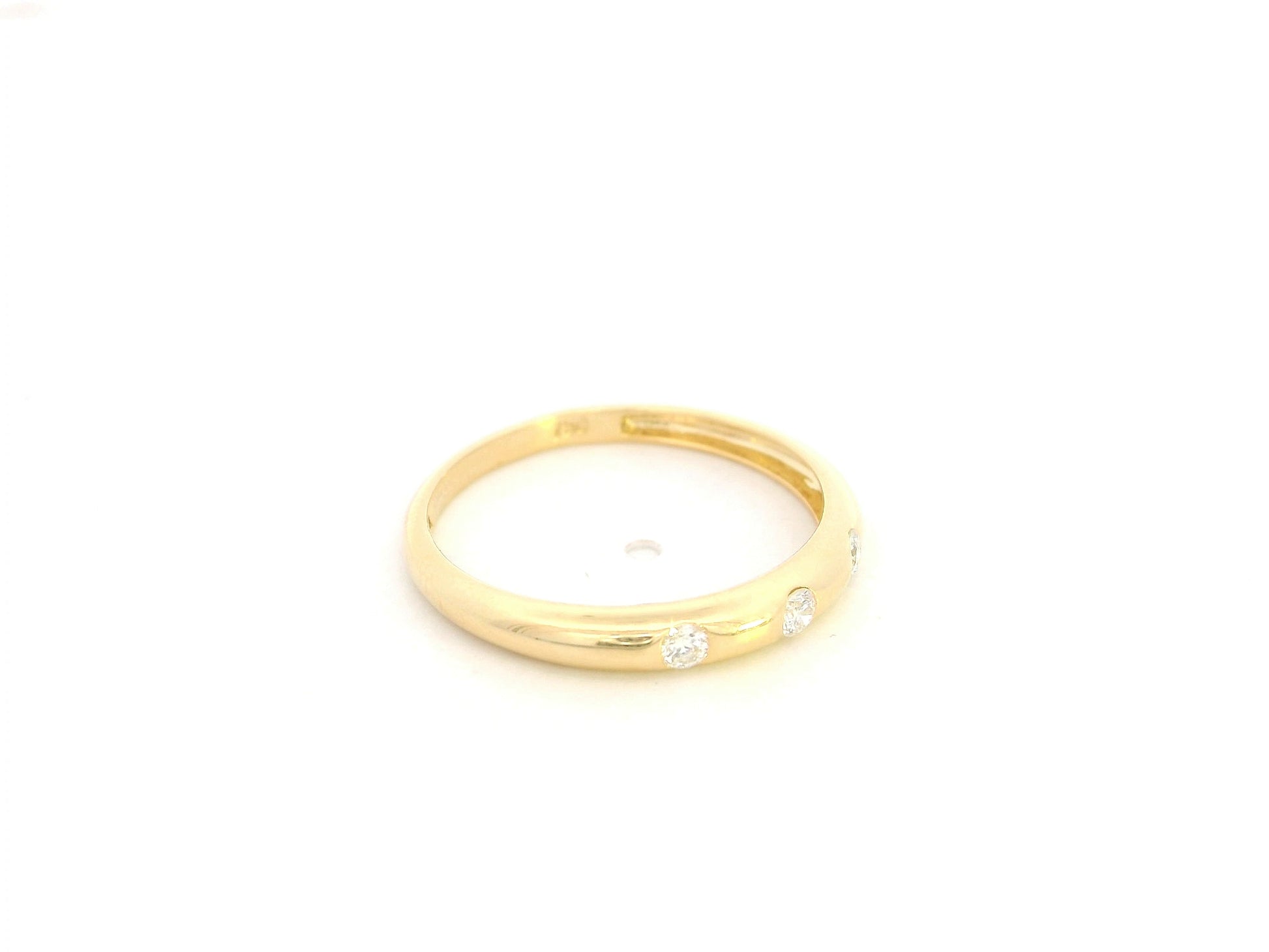 Minimal diamond band ring in 18K yellow gold with 0.13 carat diamonds
