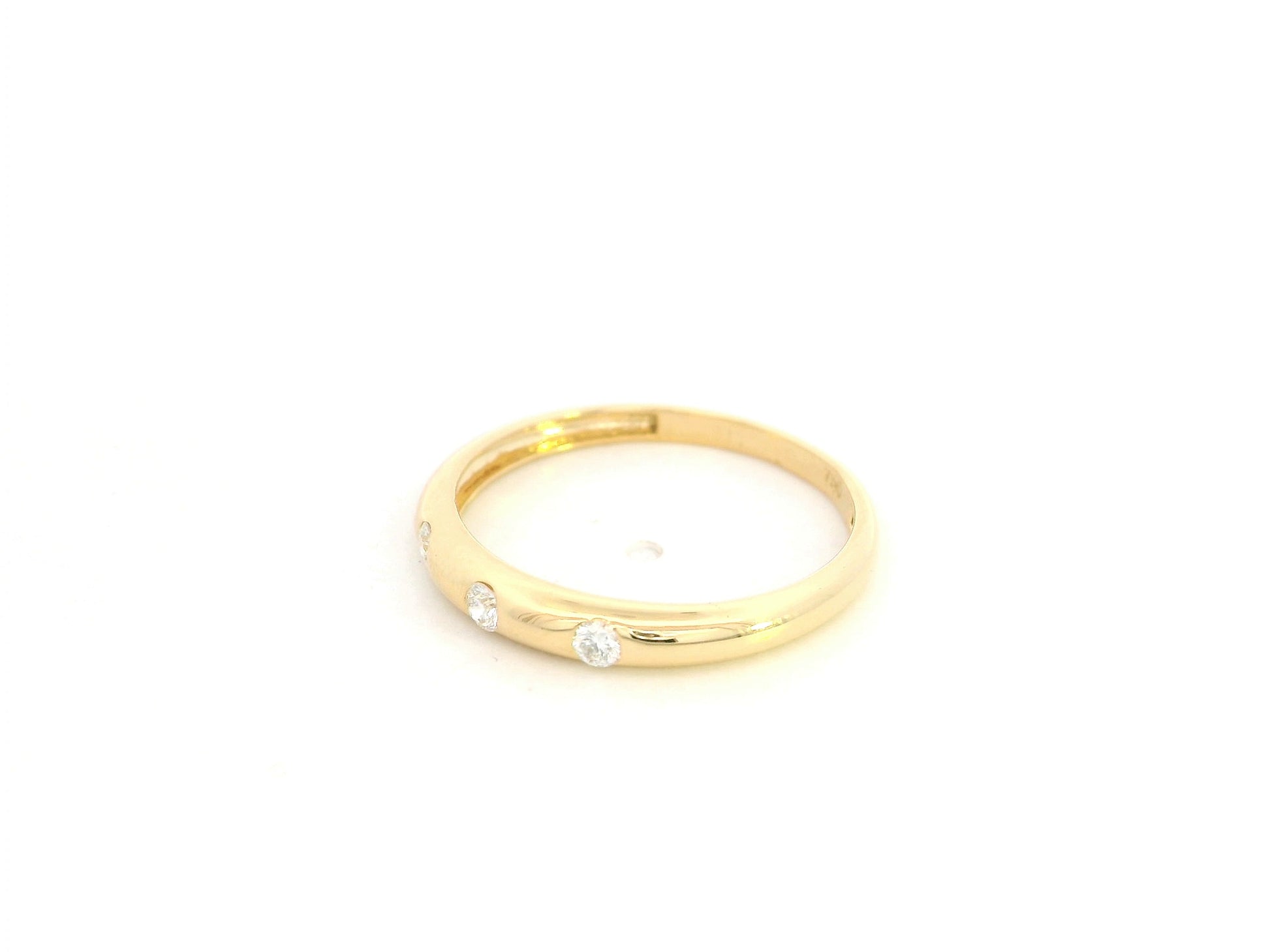 Minimal diamond band ring in 18K yellow gold with 0.13 carat diamonds