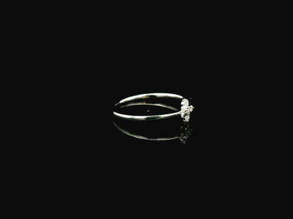 Dainty diamond floral cluster ring in 18K white gold minimal design