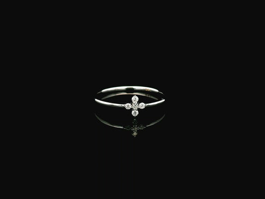 Dainty diamond floral cluster ring in 18K white gold minimal design